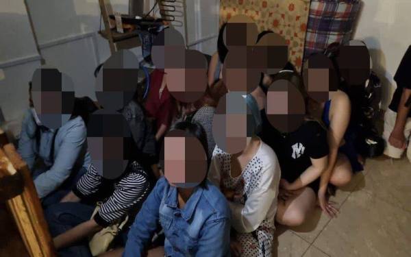 Seramai 13 wanita warga asing ditahan dalam serbuan pada Selasa. - Foto PDRM.