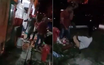 Tangkap layar video yang tular memaparkan seorang lelaki dipukul dengan kayu dalam kejadian di Jalan Silat Harimau, Iskandar Puteri, pada Isnin.