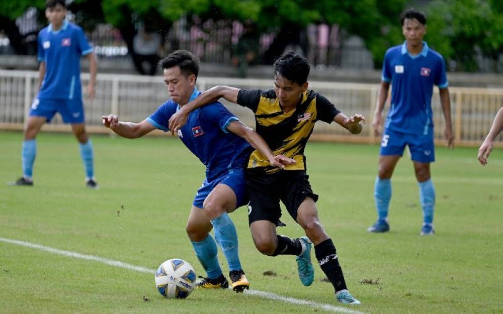 Antara aksi skuad Harimau Siswa ketika menentang Laos pada Selasa.