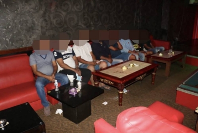 Antara individu yang ditahan dalam serbuan di sebuah premis hiburan pada Ahad.