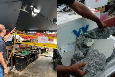 Khemah gerai peniaga berlubang akibat kepingan simen yang jatuh daripada landasan projek LRT3 dan beberapa keping simen yang jatuh dari landasan LRT3.