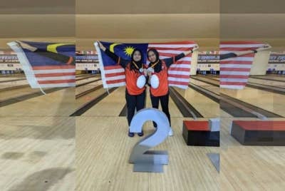 Anis Hannani dan Adania raih pingat perak pada Kejohanan Boling Remaja Asia ke-21 di Bangkok pada Selasa. - Foto KBS