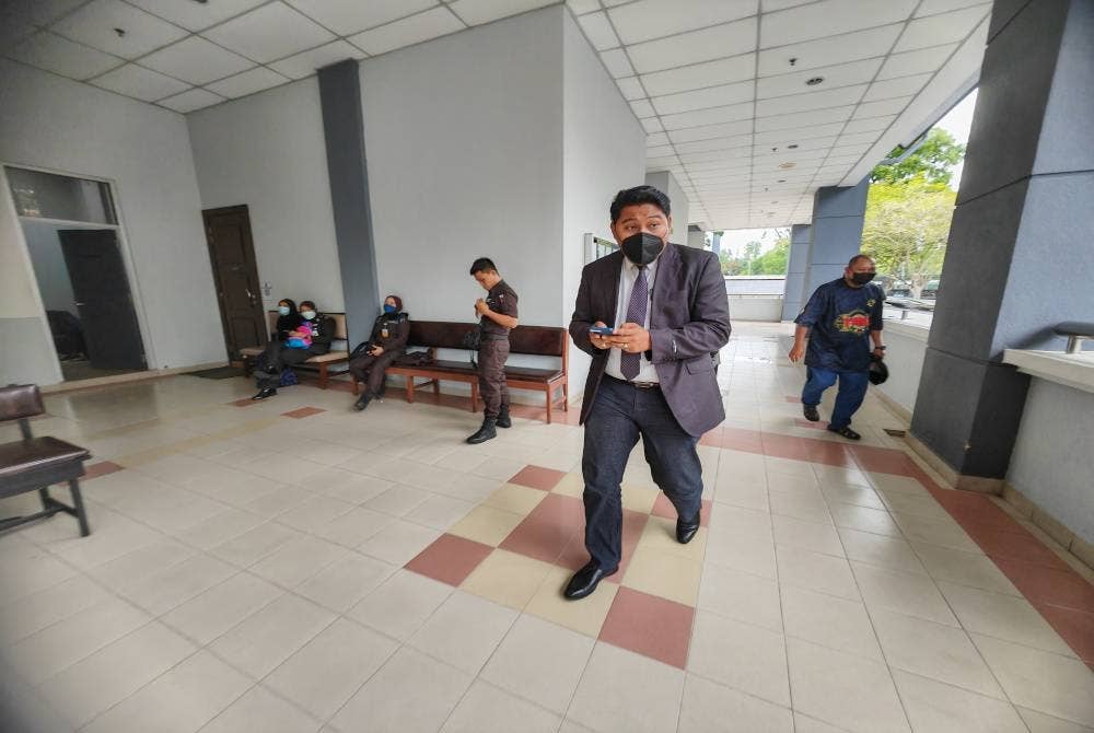 Akif Rusli ketika hadir di mahkamah pada Khamis.