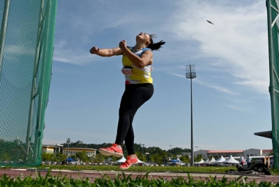 Queenie ketika beraksi dalam acara lempar cakera di temasya SUKIPT 2022