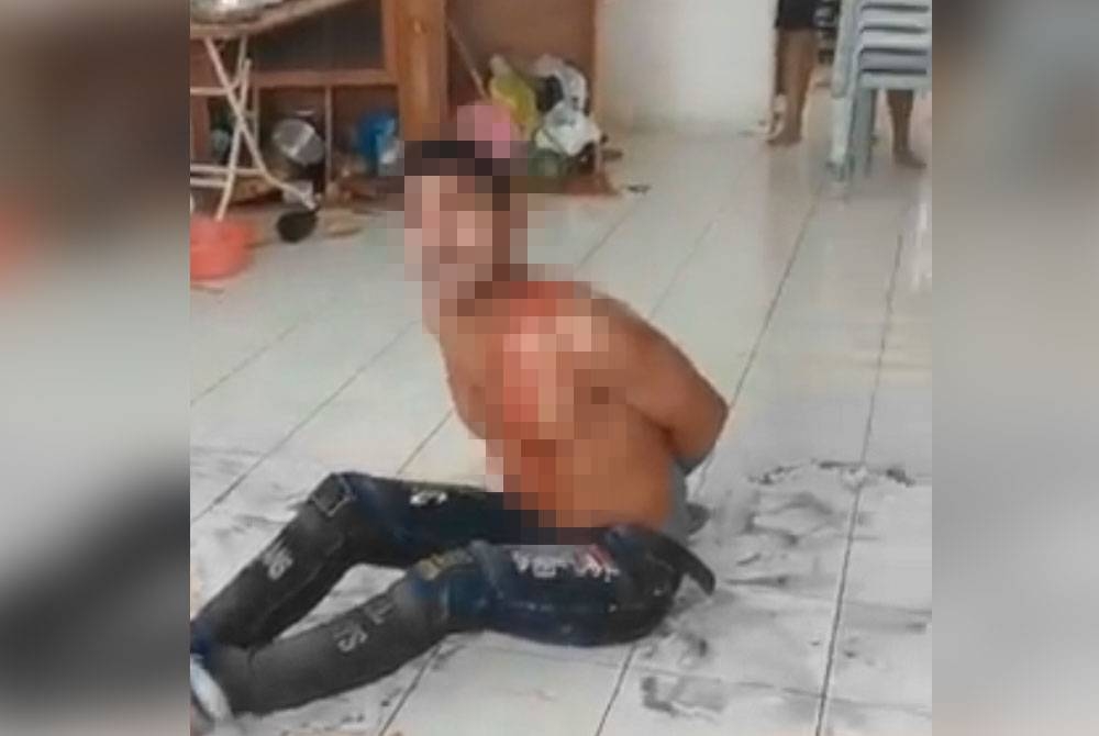 Lelaki warga asing terpaksa diikat selepas bertindak agresif dengan mencederakan dirinya sendiri.