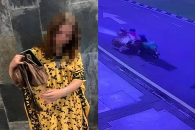 Tular video berdurasi yang memaparkan seorang wanita berbaju kelawar diragut dua lelaki.