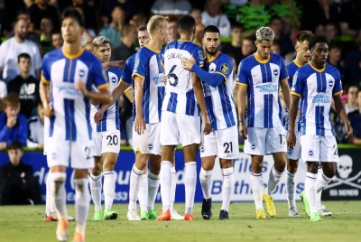 Pemain Brighton meraikan kemenangan berkenaan. - Foto Shutterstock