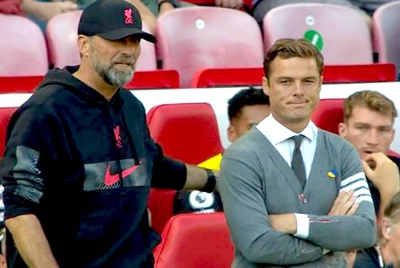 Klopp (kiri) simpati dengan nasib Parker yang dipecat Bournemouth. - Foto Agensi