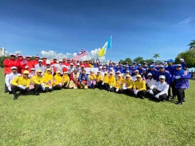 Antara peserta yang mengambil bahagian dalam sambutan Hari Kebangsaan yang ke 65 di Padang Kota pada Rabu.