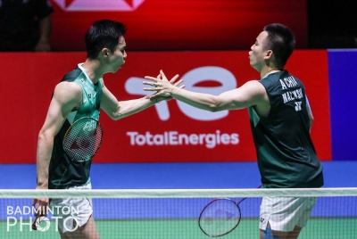 Aaron (kanan) dan Wooi Yik muncul juara pada Kejohanan Dunia di Tokyo Ahad lalu.