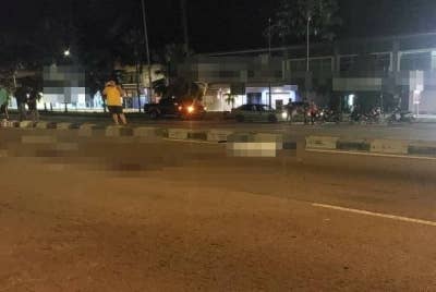 Lokasi kejadian lelaki warga Myanmar maut di Kilometer 49 Jalan Klang-Teluk Intan, berhampiran Pasir Penambang di sini pada malam Selasa.