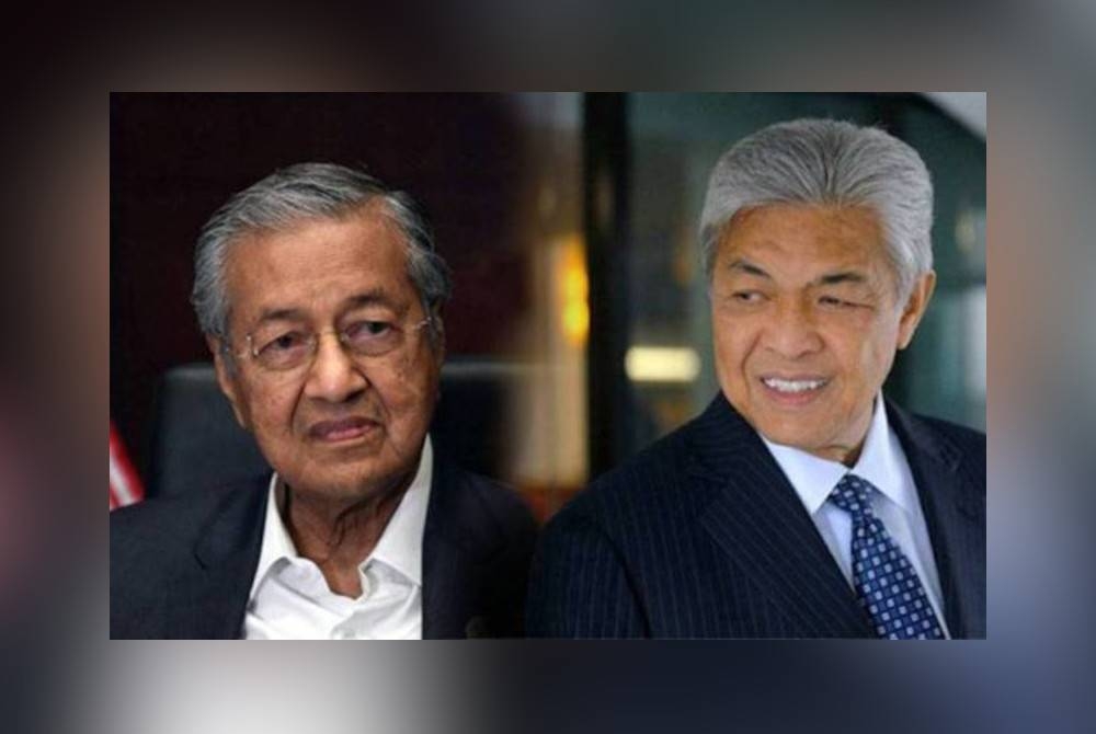 Tun Mahathir (kiri) dan Ahmad Zahid.