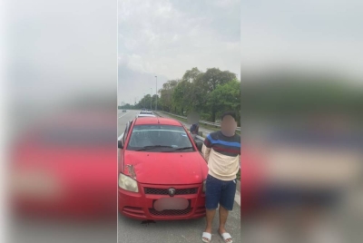 Lelaki warga Indonesia yang ditahan selepas cuba melarikan diri dari sekatan jalan raya di Lebuhraya Kesas, Shah Alam pada Sabtu lalu.