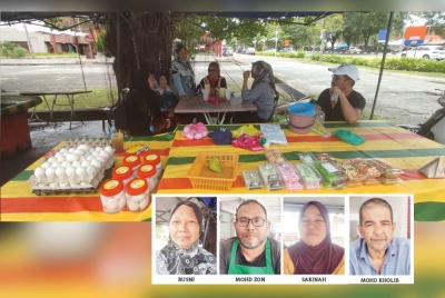 Beberapa penjaja duduk berbincang sambil menunggu pelanggan membeli makanan yang dijual mereka di Taman Wira Mergong, Alor Setar. 