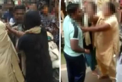 Gambar menunjukkan pergaduhan antara si suami dengan isterinya di sebuah pasar di India pada Khamis. - Foto media sosial