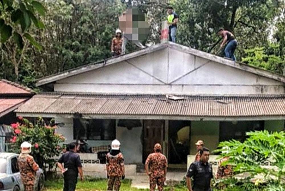 Tular gambar di media sosial anggota bomba dan polis sedang memujuk seorang lelaki mengamuk di atas bumbung rumah.