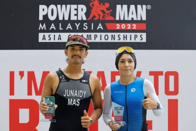 Haziq Junaidy dan Tahira Najmunisaa menyahut cabaran di Powerman Malaysia 2022 pada Ahad. - Foto Bernama