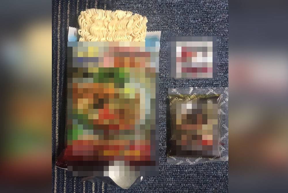 Dadah yang ditemui disorokkan dalam pek mi segera dalam serbuan di sebuah gudang di kawasan perindustrian dekat sini pada Khamis.