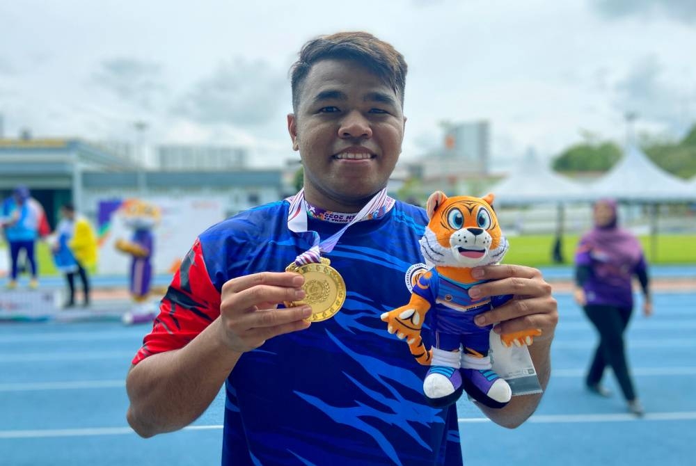 Badrul Hisam meraih pingat emas acara lempar cakera lelaki F12 Para Sukma 2022 di Stadium Mini MSN, Bukit Jalil pada Sabtu. - Foto Bernama
