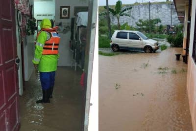 Anggota Pasukan Pusat Kawalan Operasi Daerah (PKOD) Angkatan Pertahanan Awam (APM) Kluang membuat pemantauan di kawasan banir.