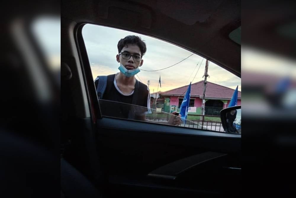 Muhammad Haikal ditemui keletihan oleh pensyarahnya ketika dia mahu pulang berjalan kaki dari Pulau Pinang ke Kelantan.