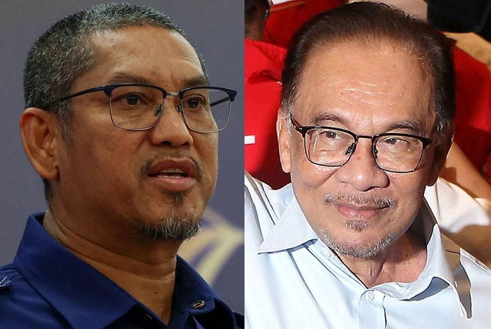 Ahmad Faizal (kiri) dan Anwar