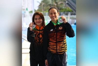 Nur Dhabitah (kiri) dan Pandelela Rinong.