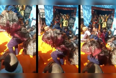 Tangkap layar rakaman video menunjukkan suspek dihukum ketuk ketampi. - Foto Agensi