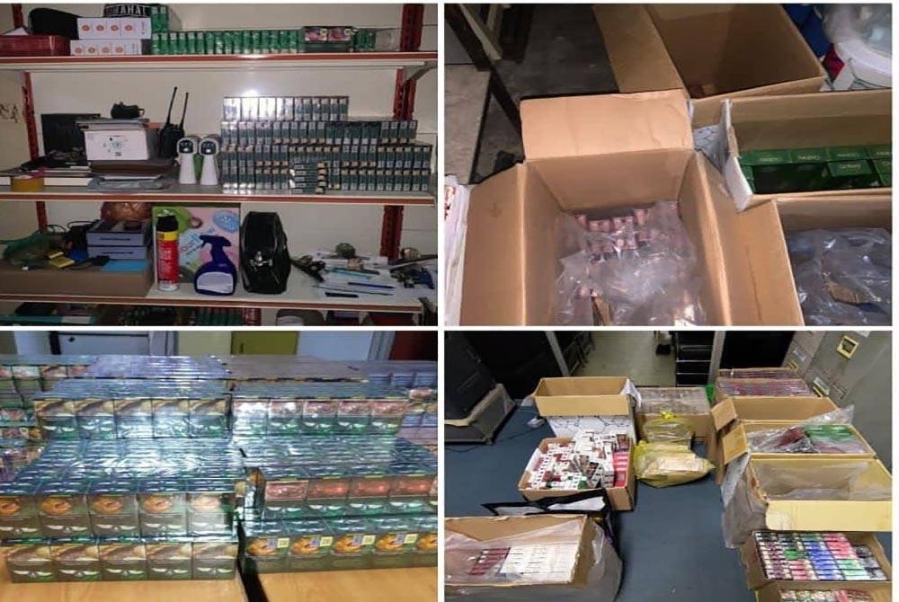 Sebahagian rokok pelbagai jenis yang dirampas polis dalam serbuan di sebuah rumah kedai di jalan Gong Badak pada Isnin. - Foto PDRM