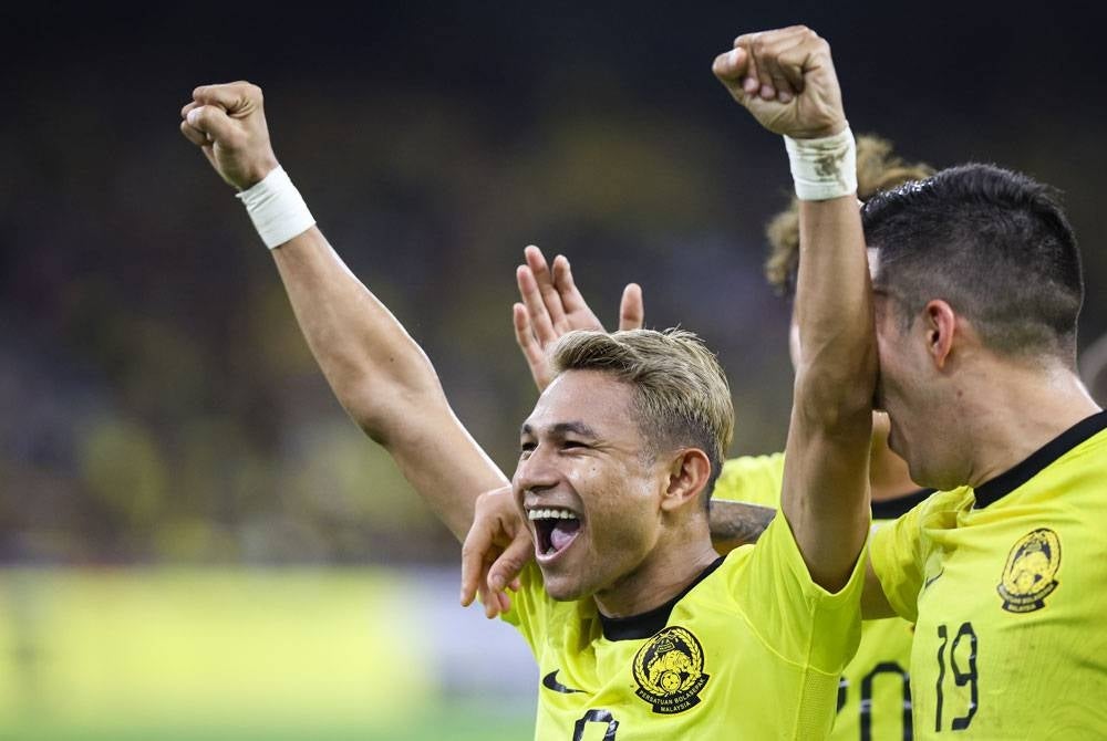 Faisal meraikan jaringan pada aksi perlawanan antara Malaysia dan Laos di Stadium Nasional Bukit Jalil malam tadi. - Foto Bernama