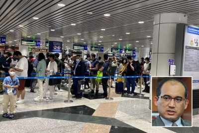 Imigresen menjalankan pemeriksaan ketat di pintu masuk negara sebagai langkah mengekang sebarang salah laku warga asing yang datang ke Malaysia. Gambar kecil: Khairul Dzaimee