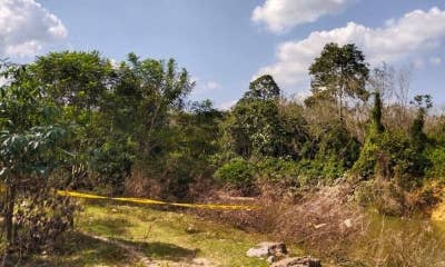 Lokasi penemuan mayat dengan empat kesan tembakan di tengkorak kepala di tebing Sungai Golok, Tanah Merah. - Foto ihsan PDRM