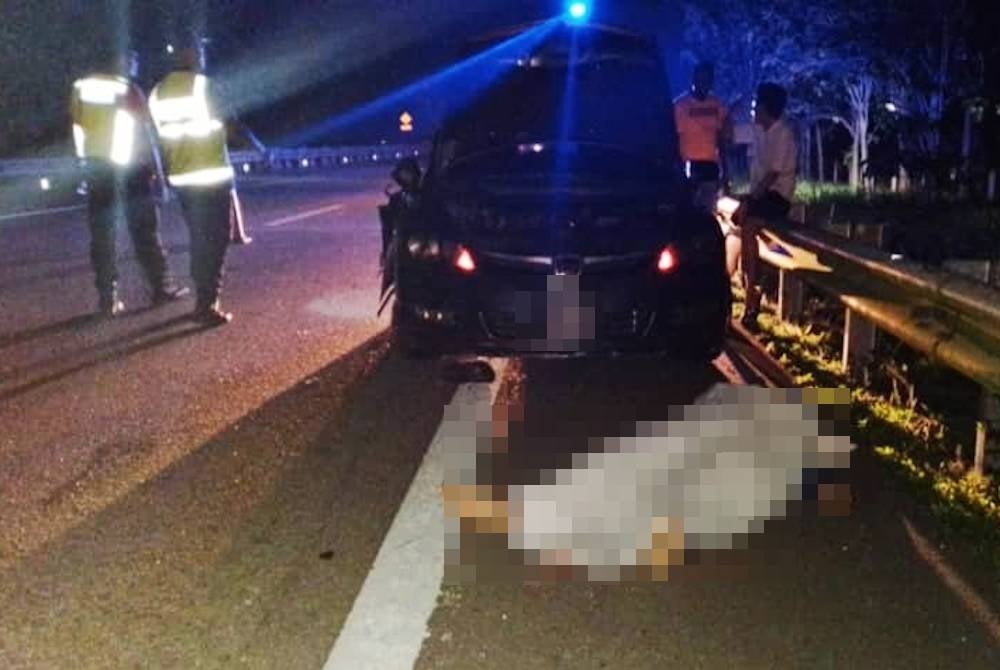 Mangsa disahkan maut di lokasi kemalangan di KM235.6 Lebuhraya Utara Selatan arah utara, Kuala Kangsar pada Selasa. - Foto pembaca