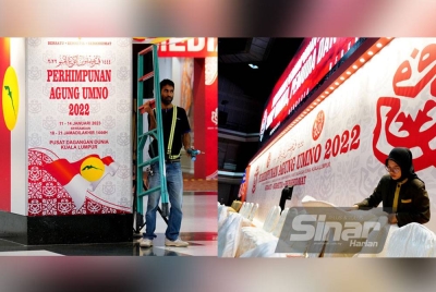 Para petugas sedang melakukan persiapan terakhir menjelang Perhimpunan Agung UMNO 2022 - Foto MOHD HALIM ABDUL WAHID