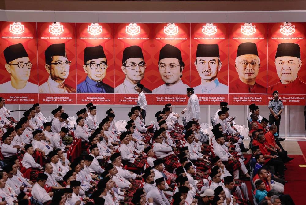 Sebahagian perwakilan Pemuda UMNO hadir pada Perhimpunan Agung Pergerakan Pemuda UMNO sempena Perhimpunan Agung UMNO 2022 di Dewan Merdeka, Pusat Dagangan Dunia Kuala Lumpur (WTCKL). - Foto Bernama