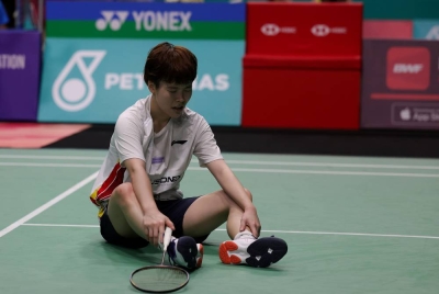 Reaksi Jin Wei selepas tewas kepada Se Young pada pusingan kedua Terbuka Malaysia 2023 di Axiata Arena Bukit Jalil sebentar tadi. - Foto Bernama