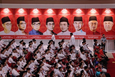 Sebahagian perwakilan Pemuda UMNO hadir pada Perhimpunan Agung Pergerakan Pemuda UMNO sempena Perhimpunan Agung UMNO 2022 di Dewan Merdeka, Pusat Dagangan Dunia Kuala Lumpur (WTCKL). - Foto Bernama