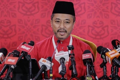 Isham Jalil pada sidang media sempena Perhimpunan Agung UMNO 2022 di WTCKL pada Jumaat. - Foto: Bernama