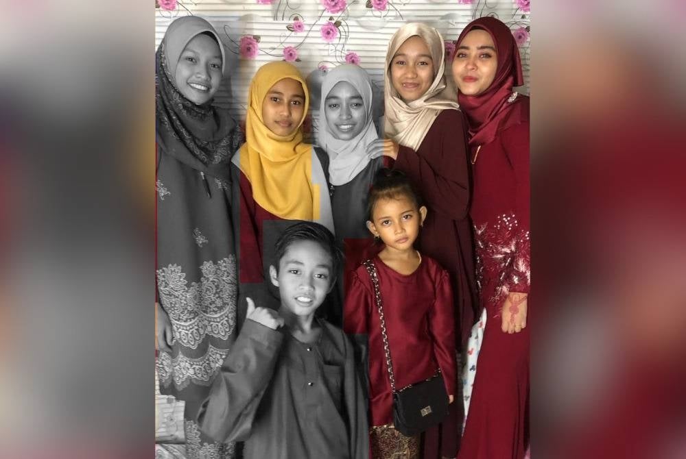 Gambar kenangan pada Aidilfitri lalu, Siti Nurzannah (belakang, kiri), Masrina (tengah), Mohd Ashraf (depan, kiri) dan Annalesha (depan, kanan).