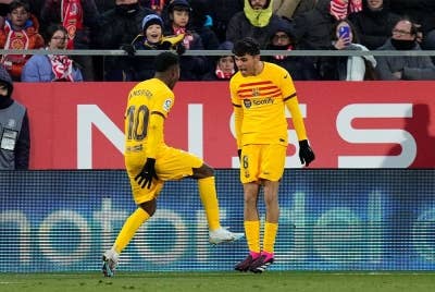 Pedri (kanan) meraikan jaringannya bersama Ansu Fati dalam aksi La Liga menentang Girona.