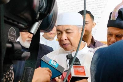 Ahmad Zahid ketika ditemui pemberita selepas majlis Personaliti Quran di Nasyrul Quran pada Isnin.
