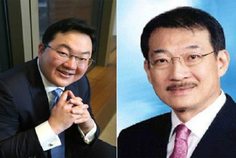 Jho Low (kiri) dan bapanya, Tan Sri Larry Low Hock Peng (kanan) - Foto Bernama