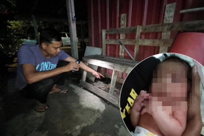 Ahmad Fauzi menunjukkan lokasi bayi ditemui di Perumahan Kondo Rakyat Kuala Ibai di Kuala Terengganu. Gambar kecil: Bayi lelaki yang ditemui pada petang Ahad.