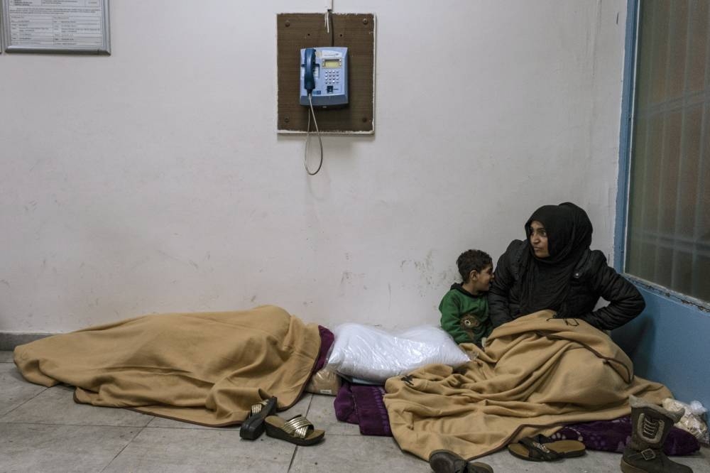 epa10452223 People take shelter in a state building following an earthquake in Diyarbakir, Turkey, 06 February 2023 (issued 07 February 2023). More than 4,000 people were killed and thousands more injured after a major 7.8 magnitude earthquake struck southern Turkey and northern Syria on 06 February. Authorities fear the death toll will keep climbing as rescuers look for survivors across the region. EPA/REFIK TEKIN