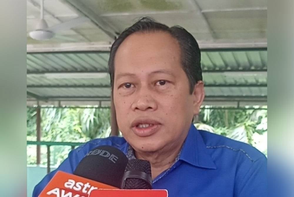 AHMAD MASLAN