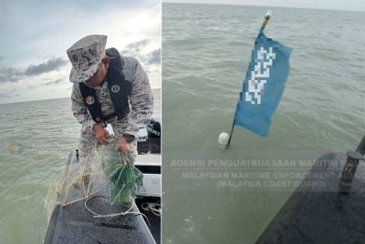 Pegawai Maritim Malaysia merampas bubu naga yang ditemui. Gambar kanan. Penemuan bendera di perairan Kerian membongkarkan kegiatan perikanan menggunakan bubu naga. -- Foto ihsan Maritim Malaysia