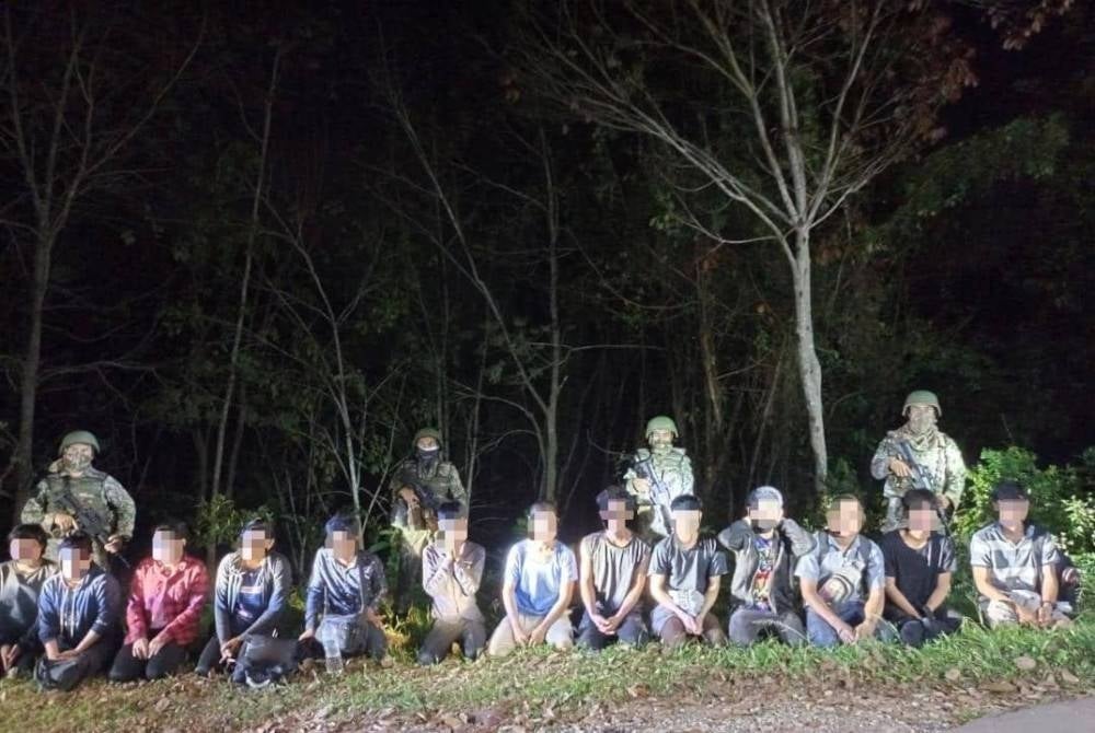 Sekumpulan 13 PATI warga Myanmar yang ditahan ketika cuba masuk secara haram ke Malaysia.