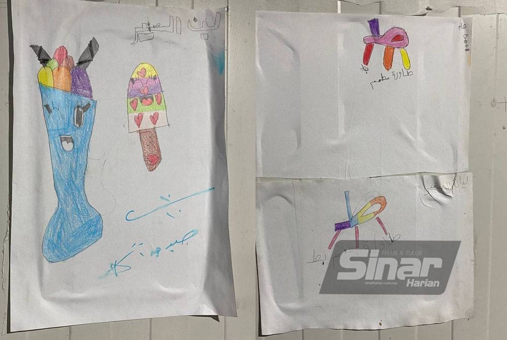 Hanya lukisan hasil tangan Hanan dan Adnan diabdikan di dinding kelas sebagai kenangan buat rakan sekelas mereka.