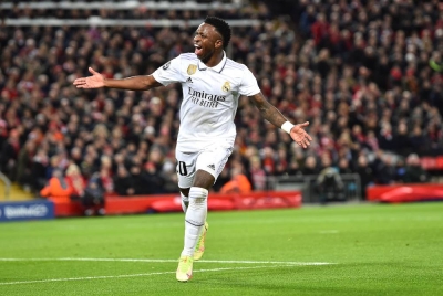 Vinicius meraikan jaringannya ketika menentang Liverpool dalam perlawanan pertama pusingan 16 terbaik Liga Juara-Juara pada Rabu. - Foto EPA