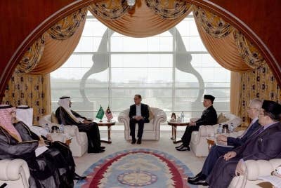 Anwar menerima kunjungan hormat Menteri Haji dan Umrah Arab Saudi Dr Tawfiq Fawzan Al-Rabiah di Bangunan Perdana Putra. -Foto Bernama